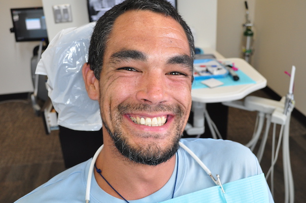 Smiling patient with dental implants